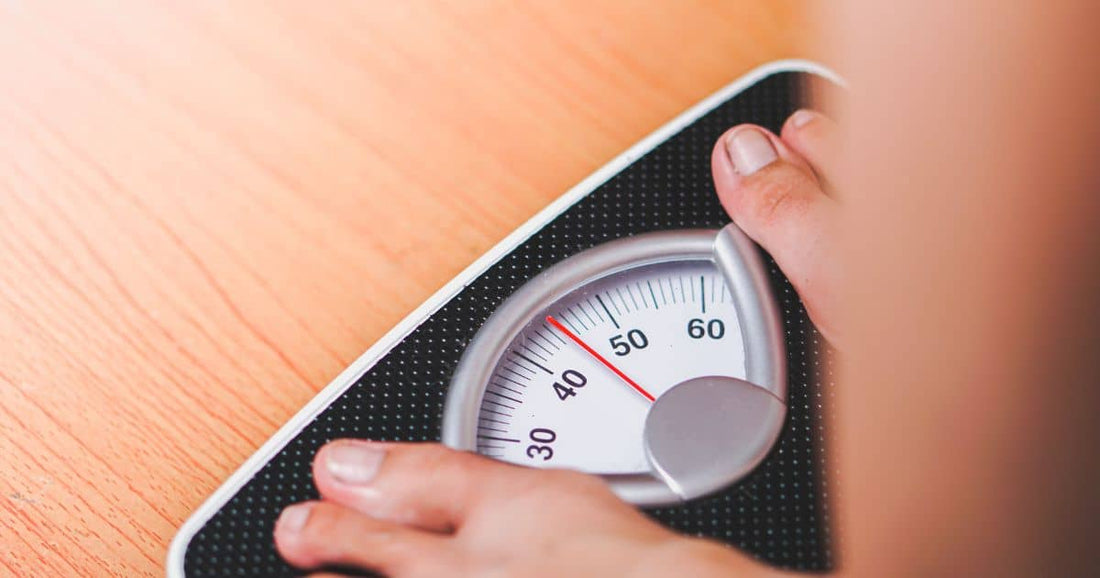 Füsse auf Waage – Fortschritt beim Abnehmen messen